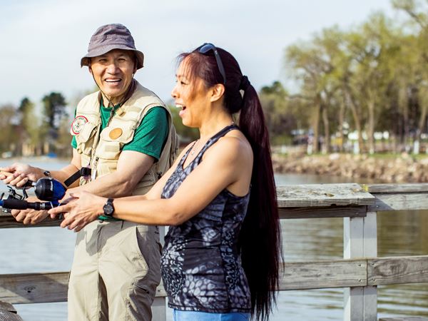 Father and Daughter Fishing at Memorial Park on Shell Lake in Washburn County